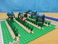 4 Miku-chans work in a vegetable garden model of Lego.