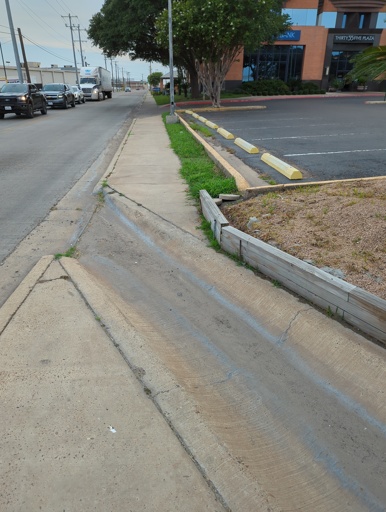 Broken sidewalk